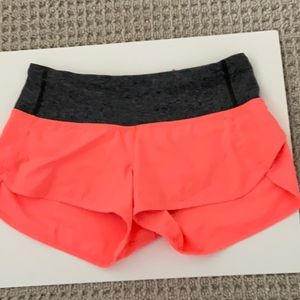EUC Lululemon speed short size 4. Coral with Heathered black waistband